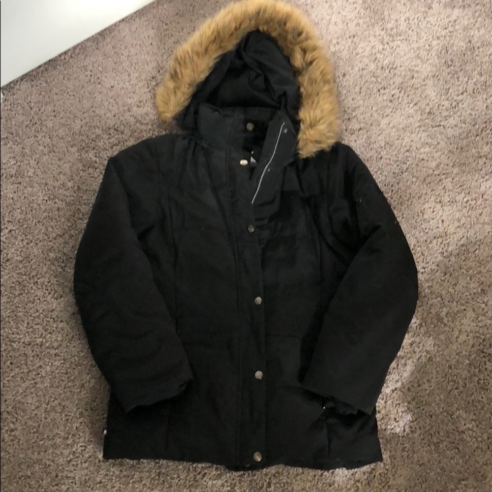 Black snowboarding or skiing jacket with fur hood